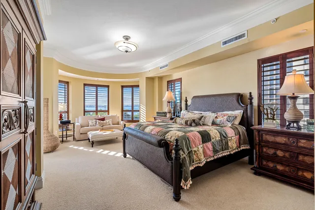 a bed room with a bed and a couch