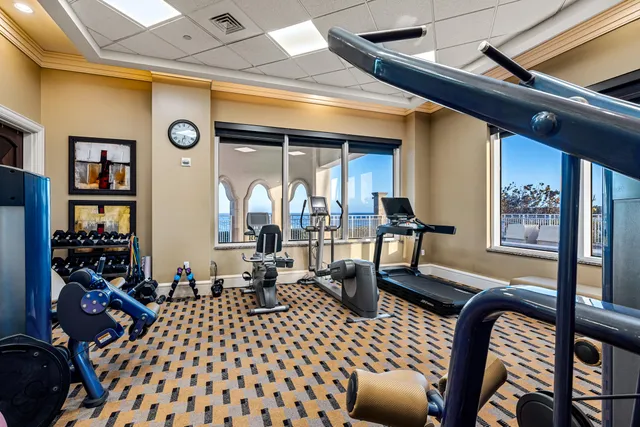 a view of a patio with table and chairs