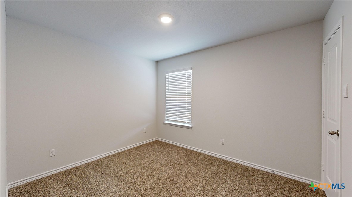 2057 Buckner Street Nolanville, TX 76559 - Photo 26 of 33 an empty room with windows