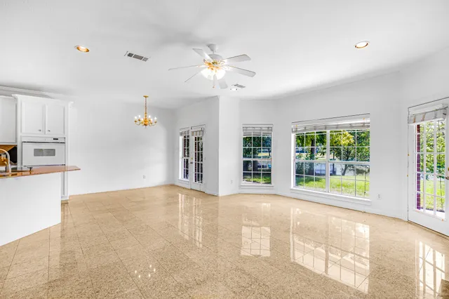a view of an entryway with a floor to ceiling window