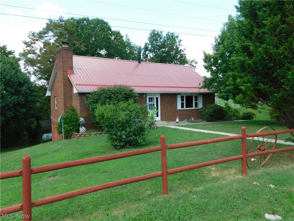 31 Pine Run Road Washington, WV 26181 - Photo 1 of 25 Front view with home sitting on corner lot.