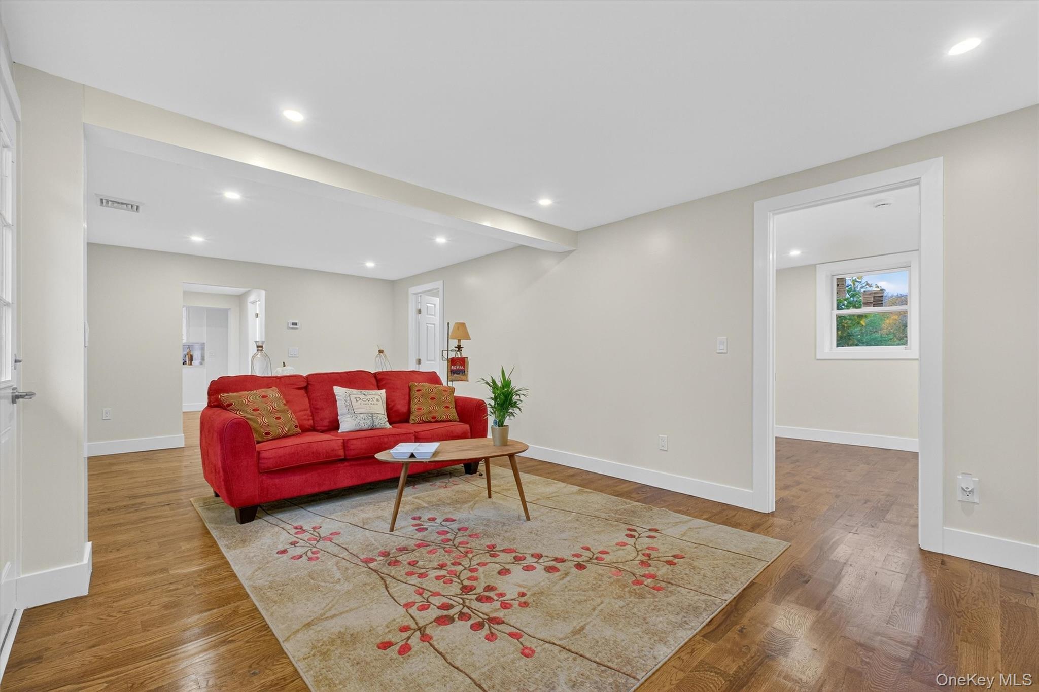 86 Vassar Road Poughkeepsie, NY 12603 - Photo 9 of 31 Living room featuring wood finished floors, recessed lighting, and beam ceiling