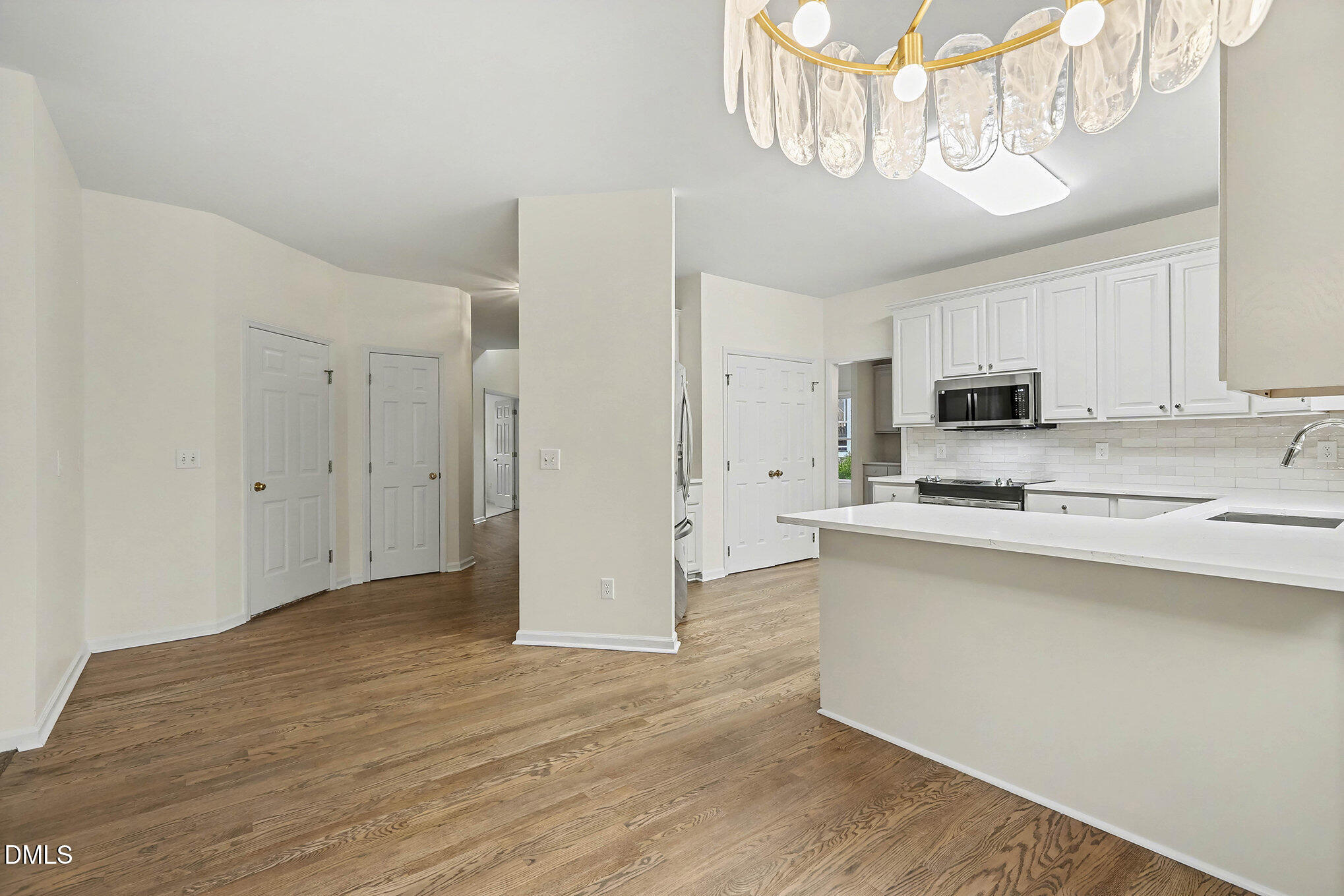 10415 Ashmead Lane Raleigh, NC 27614 - Photo 11 of 44 a view of a kitchen with microwave and cabinets