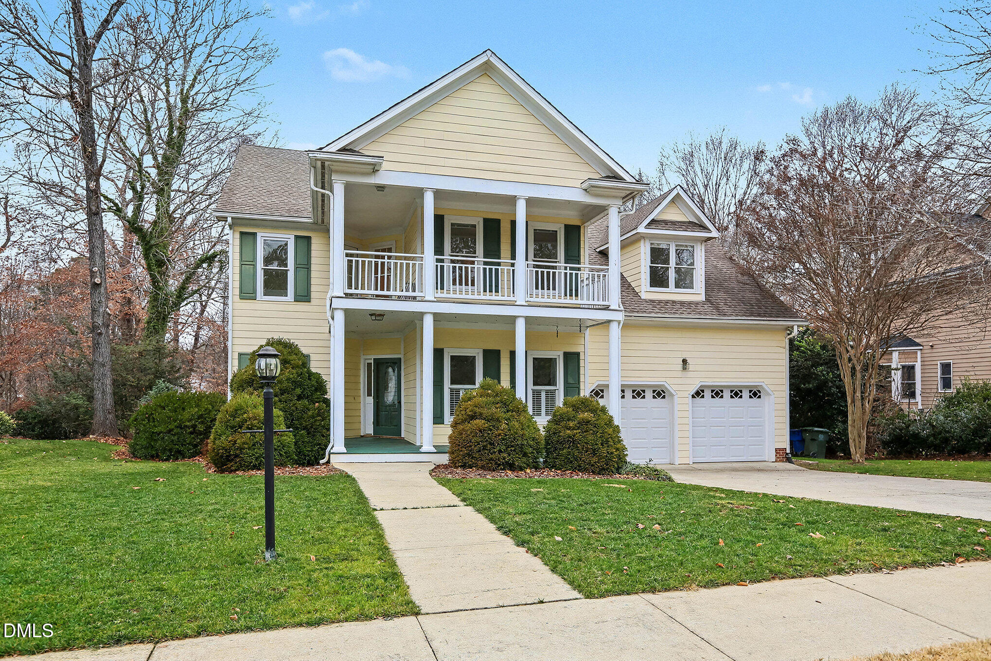 10415 Ashmead Lane Raleigh, NC 27614 - Photo 2 of 44 a front view of a house with a yard and trees