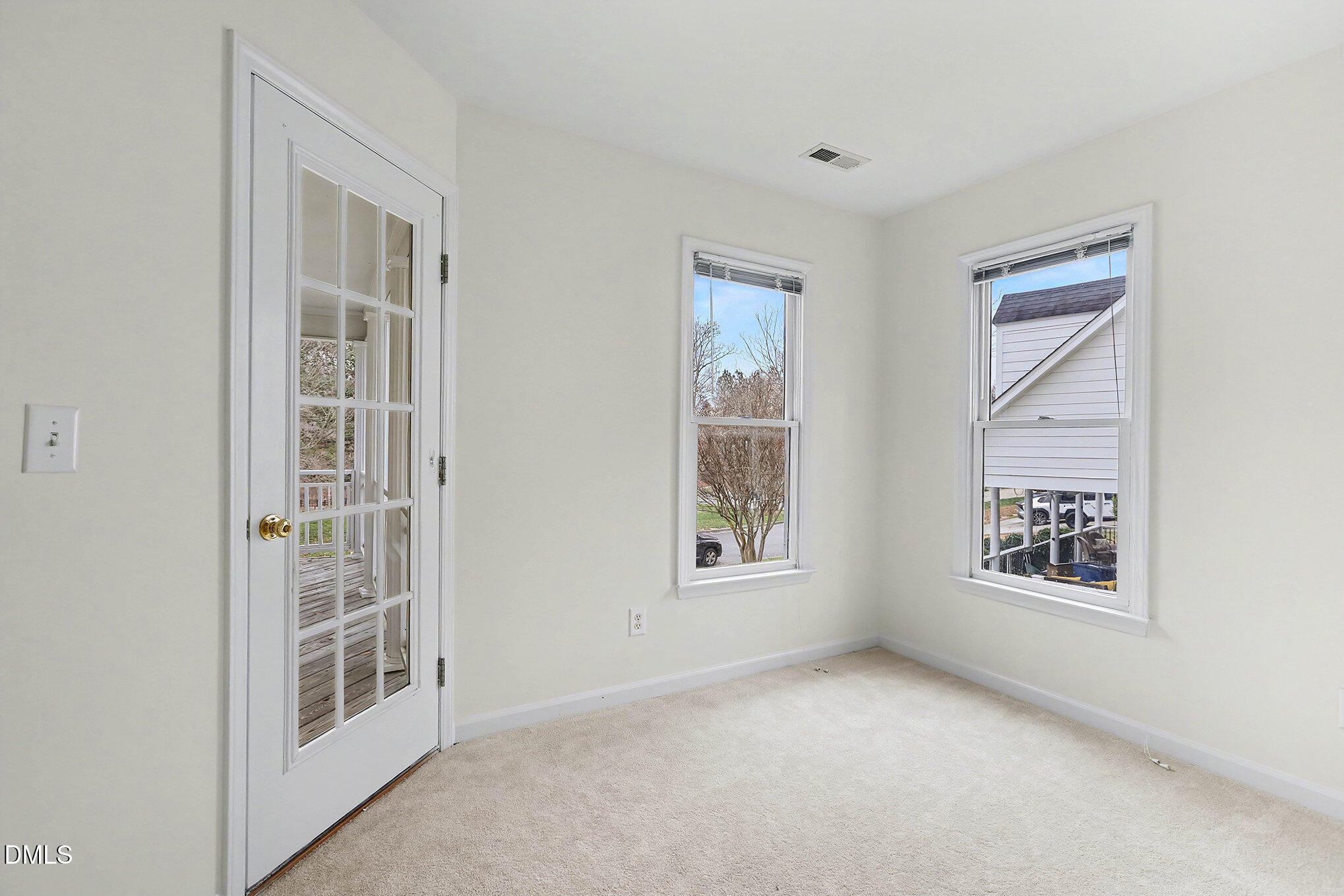10415 Ashmead Lane Raleigh, NC 27614 - Photo 25 of 44 a view of an empty room with a window