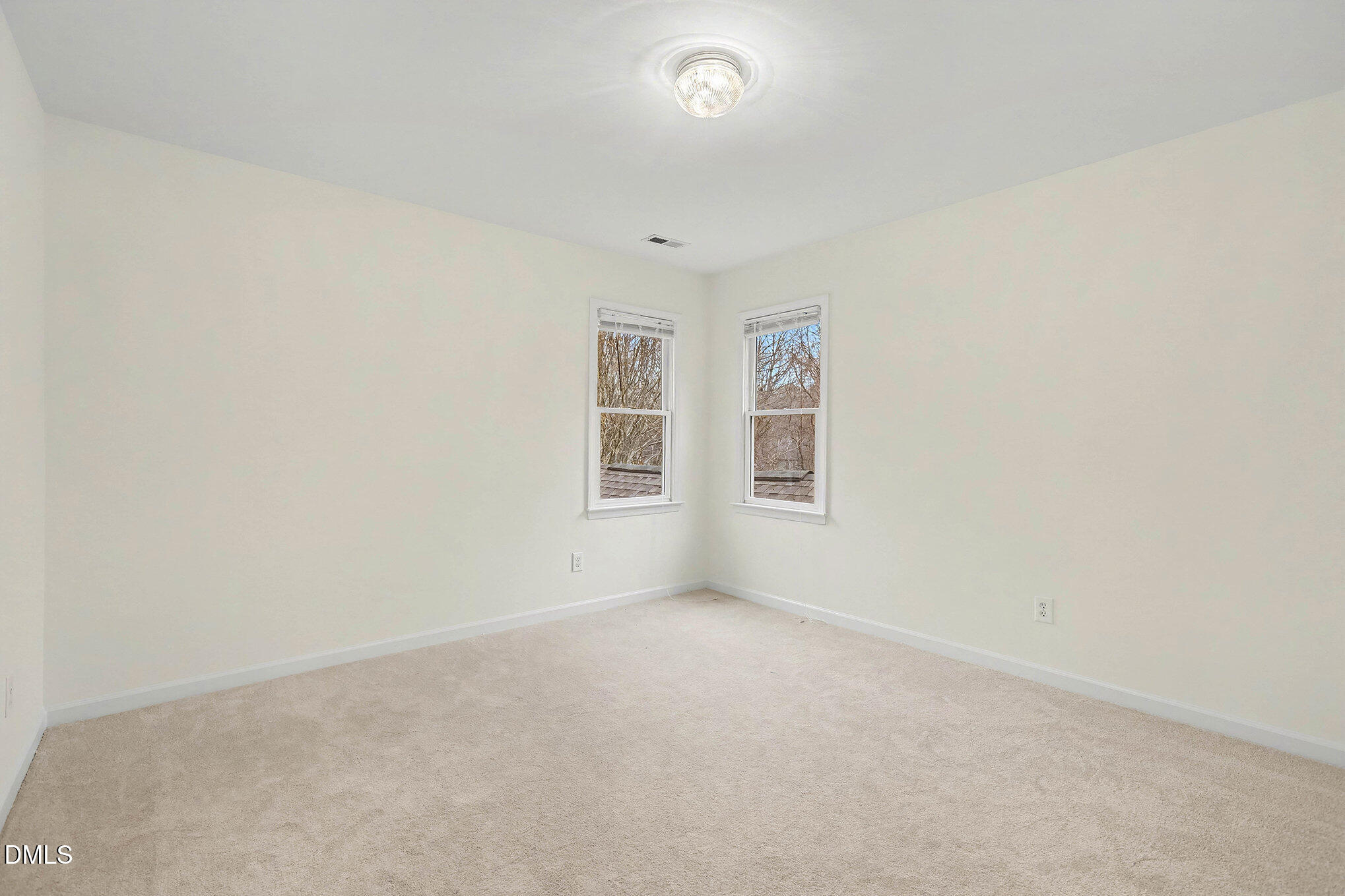 10415 Ashmead Lane Raleigh, NC 27614 - Photo 30 of 44 an empty room with windows