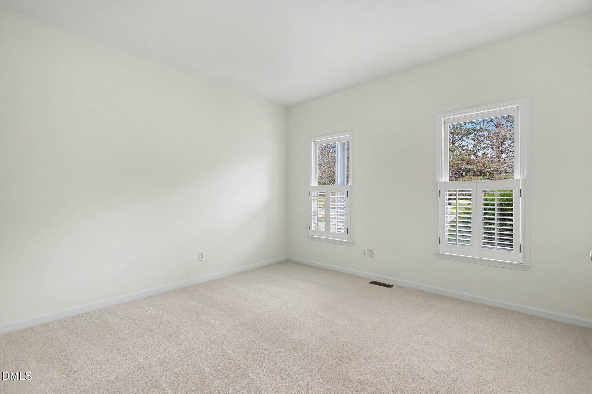 10415 Ashmead Lane Raleigh, NC 27614 - Photo 33 of 44 a view of an empty room with a window