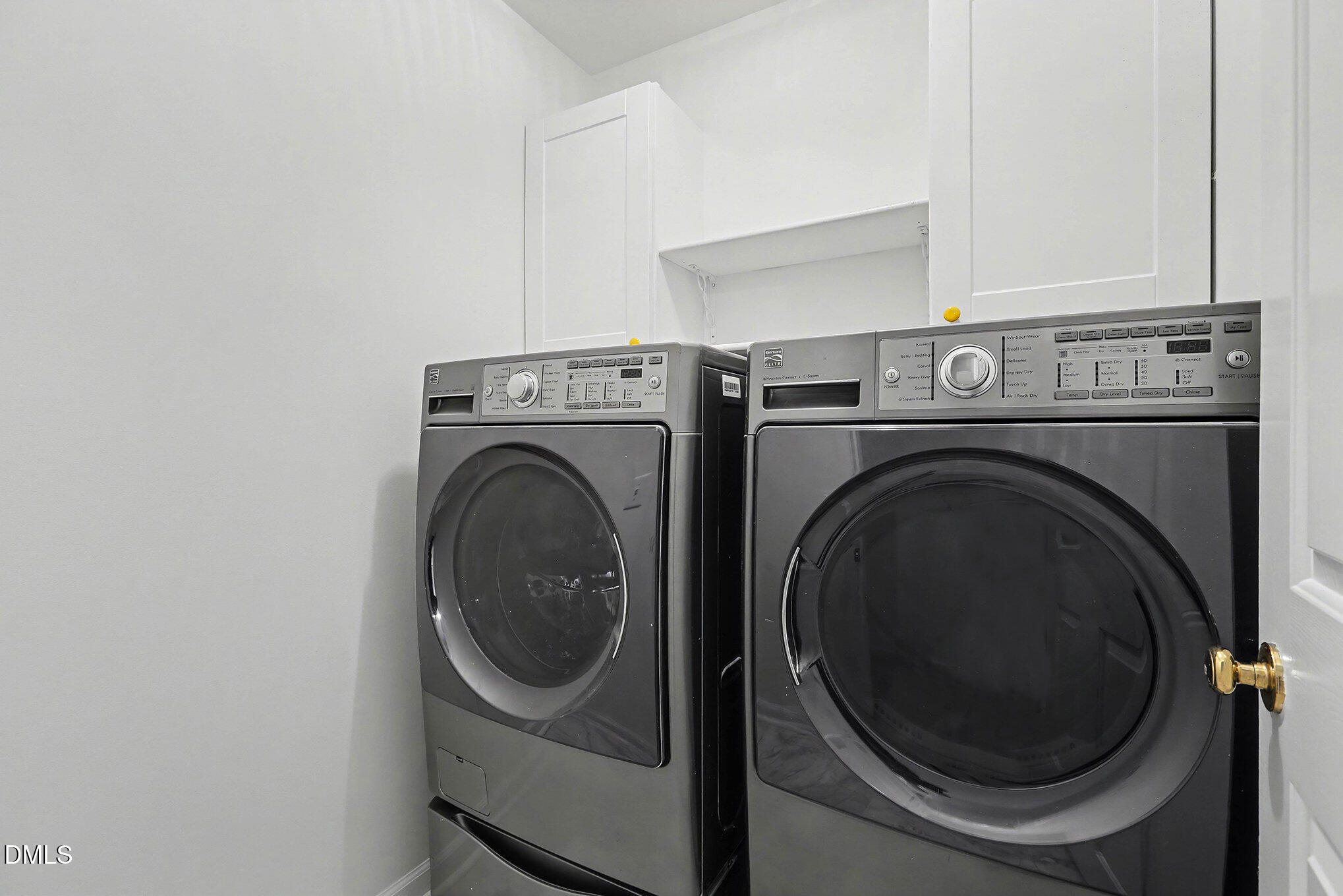 10415 Ashmead Lane Raleigh, NC 27614 - Photo 34 of 44 a utility room with dryer and washer