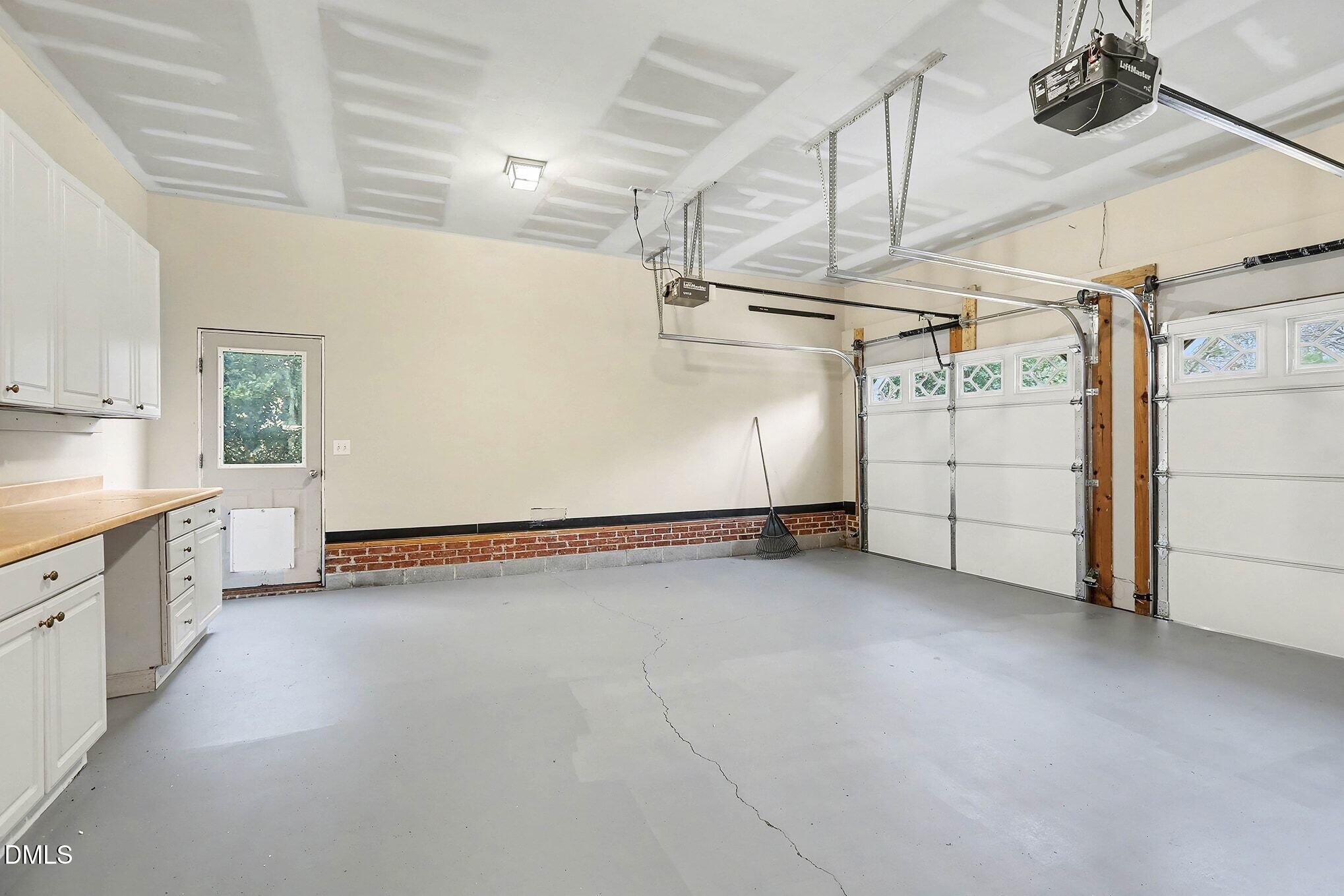 10415 Ashmead Lane Raleigh, NC 27614 - Photo 35 of 44 a view of a garage with furniture