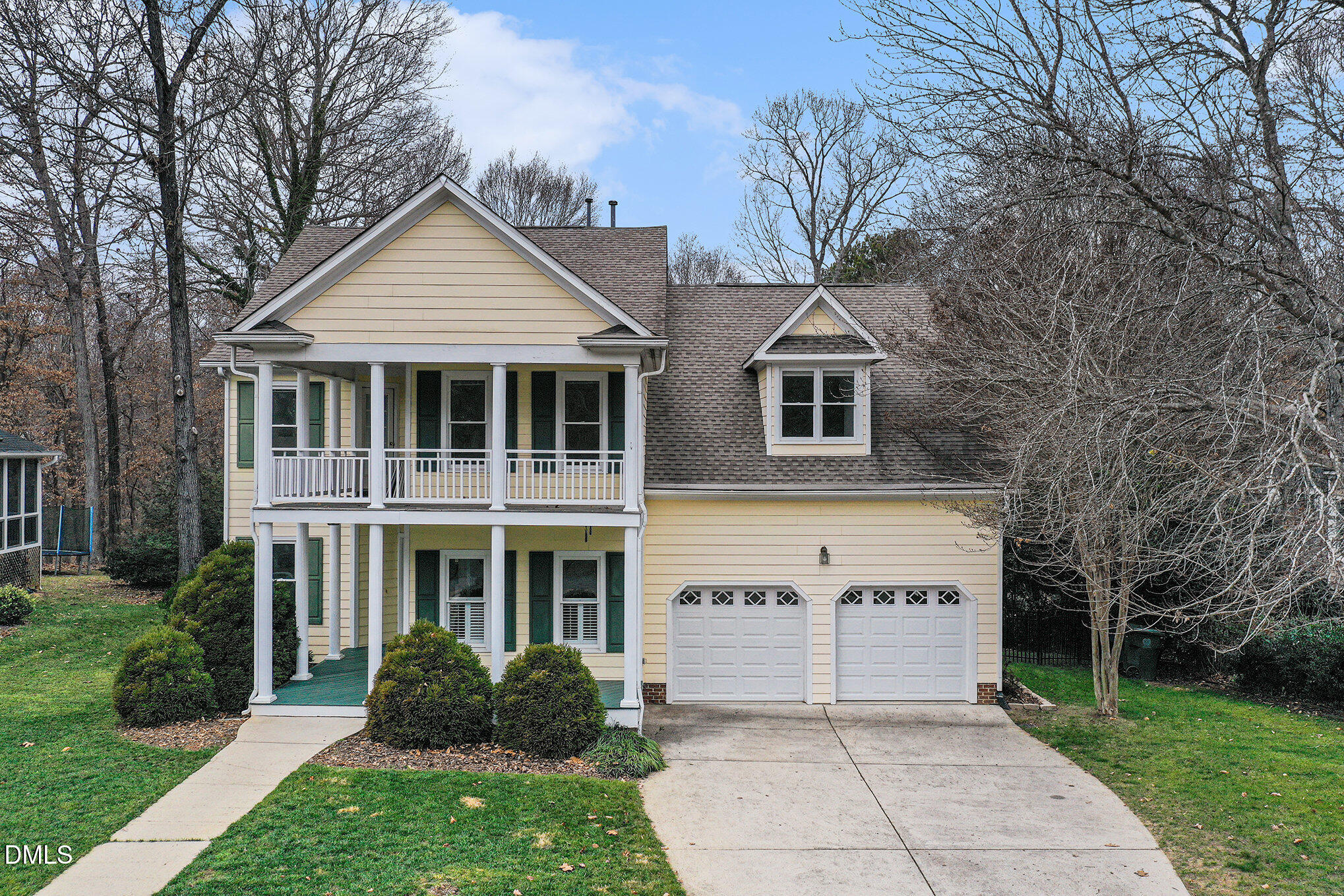 10415 Ashmead Lane Raleigh, NC 27614 - Photo 39 of 44 a front view of a house with a garden