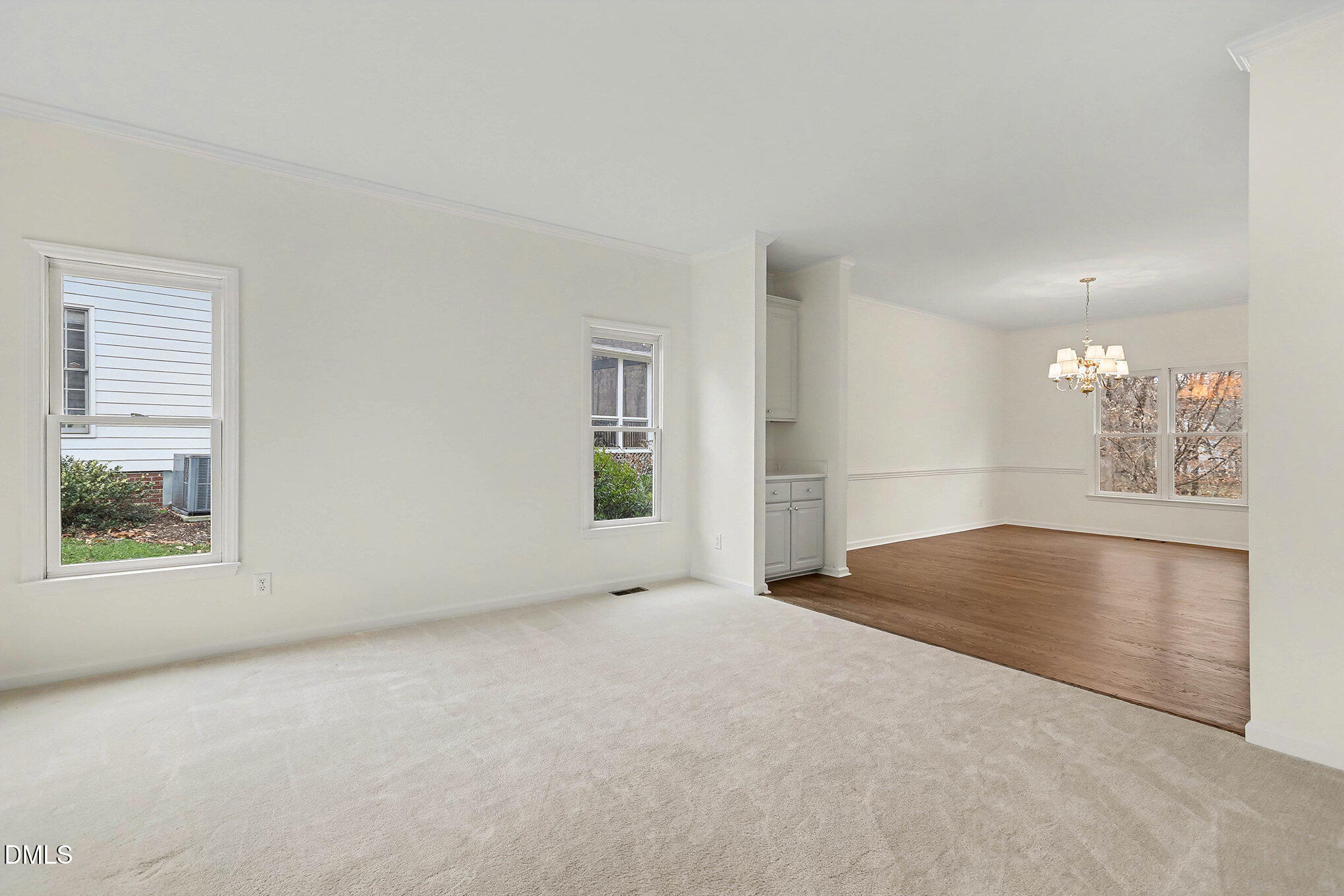 10415 Ashmead Lane Raleigh, NC 27614 - Photo 6 of 44 an empty room with windows
