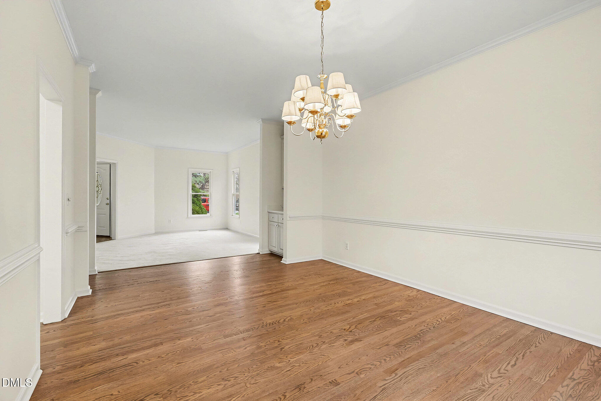 10415 Ashmead Lane Raleigh, NC 27614 - Photo 8 of 44 a view of empty room with wooden floor