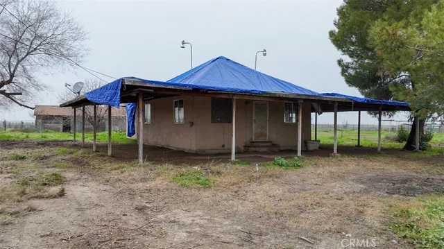 a view of a barn with a yard