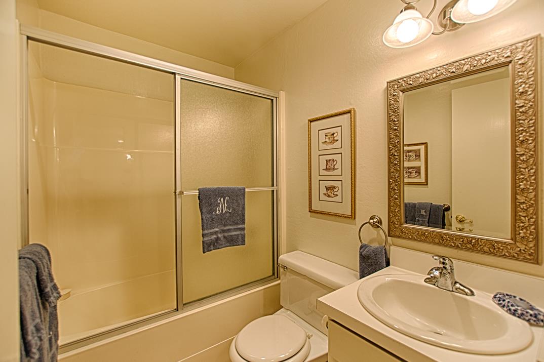 101 Shell Road, Unit 210 Watsonville, CA 95076 - Photo 13 of 26 a bathroom with a sink toilet and shower