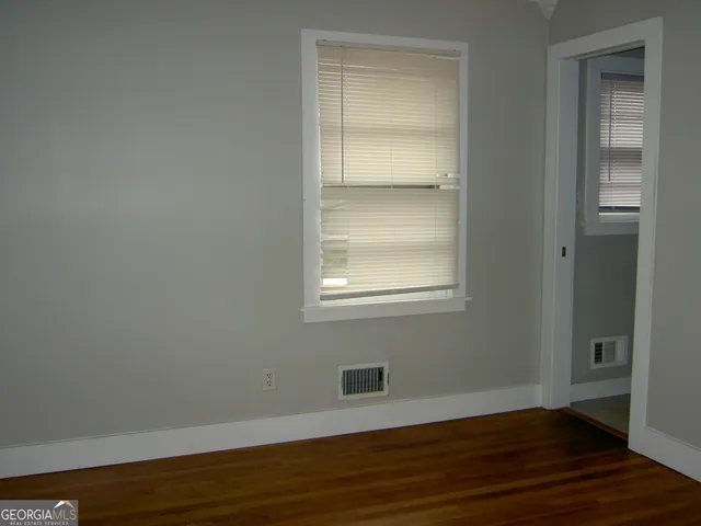 a bathroom with a mirror