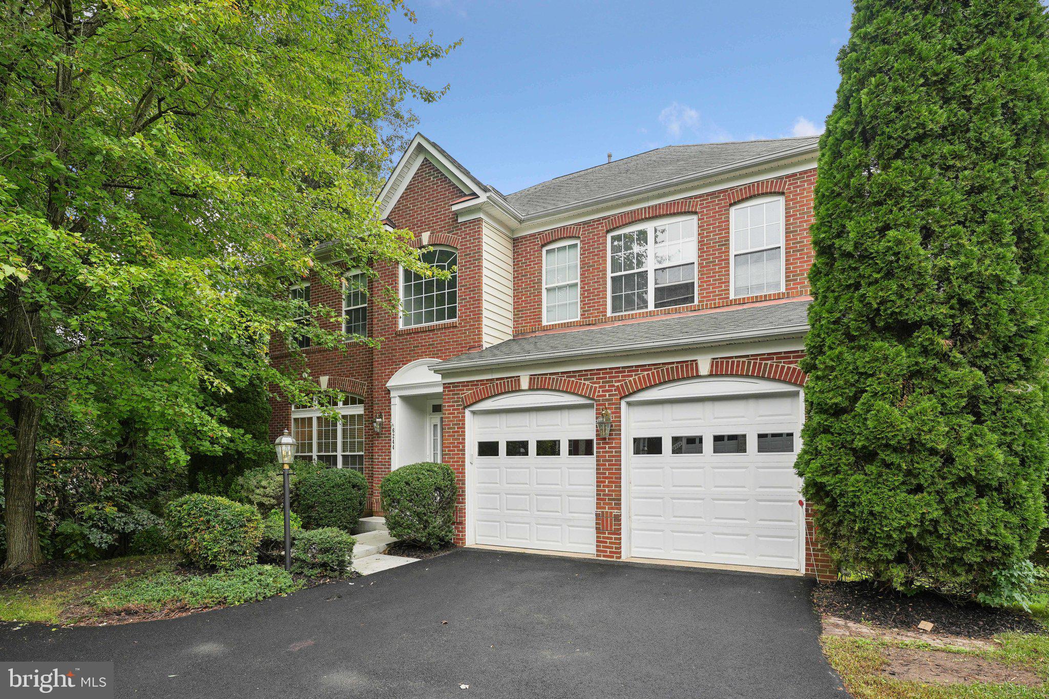 6244 Rolling Spring Court Springfield, VA 22152 - Photo 2 of 50 front view of a house with a yard