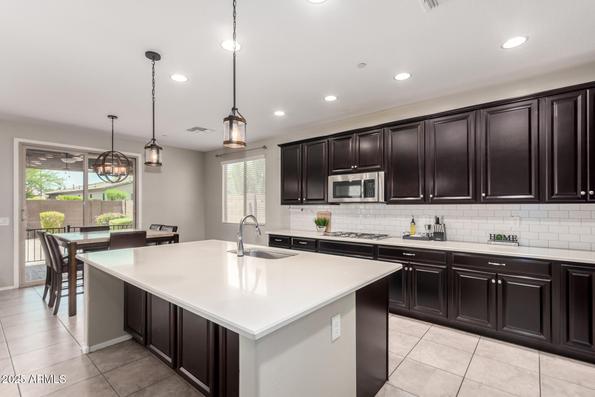 21243 West Coronado Road Buckeye, AZ 85396 - Photo 9 of 49 a kitchen with lots of counter top space