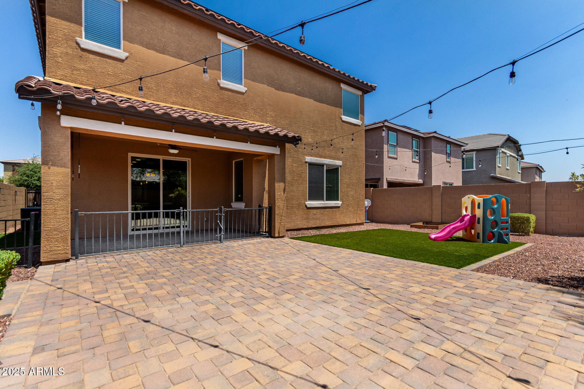 21243 West Coronado Road Buckeye, AZ 85396 - Photo 32 of 49 a front view of a house with garden