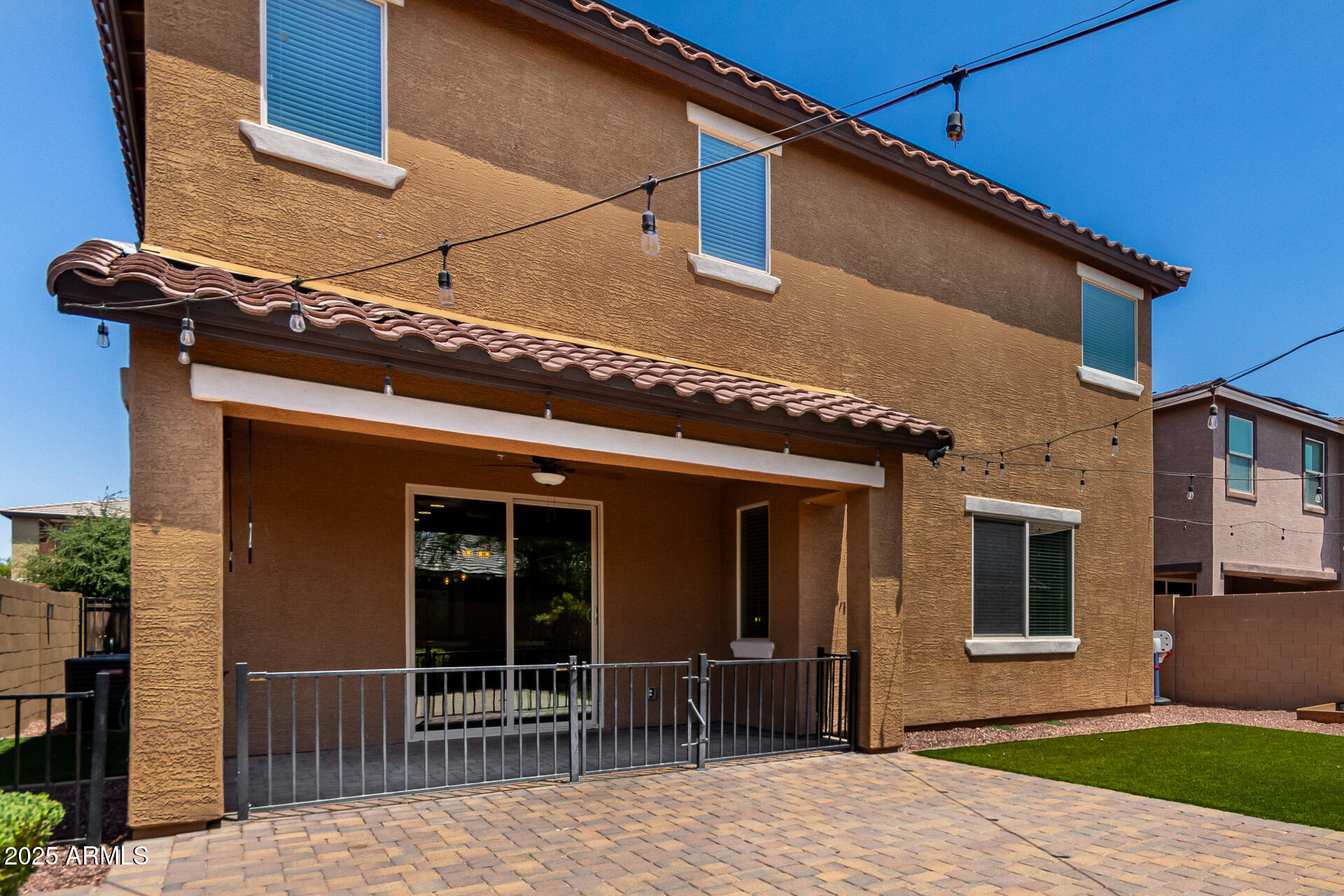 21243 West Coronado Road Buckeye, AZ 85396 - Photo 35 of 49 a front view of a house with a porch