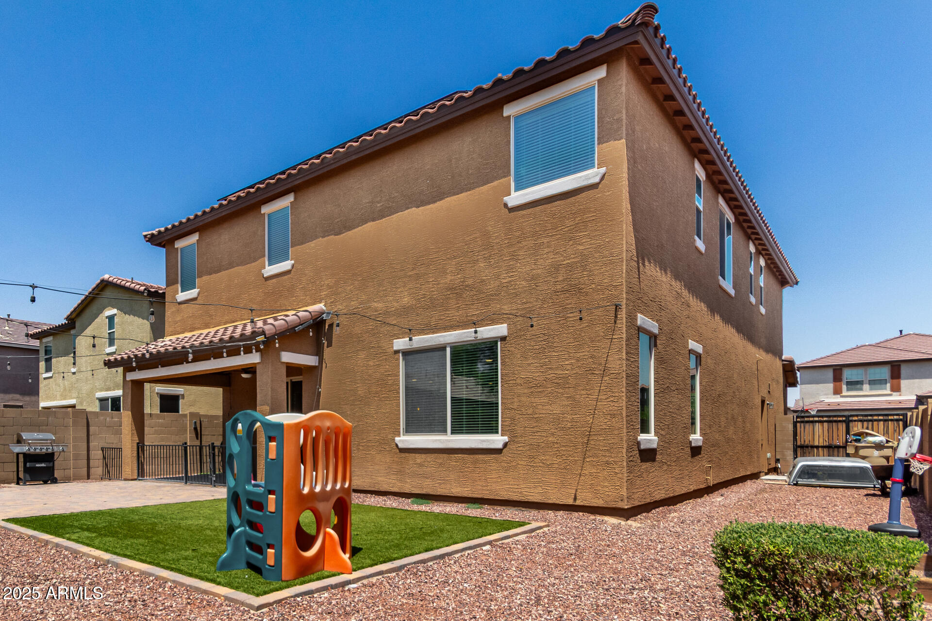 21243 West Coronado Road Buckeye, AZ 85396 - Photo 37 of 49 a front view of a house with garden