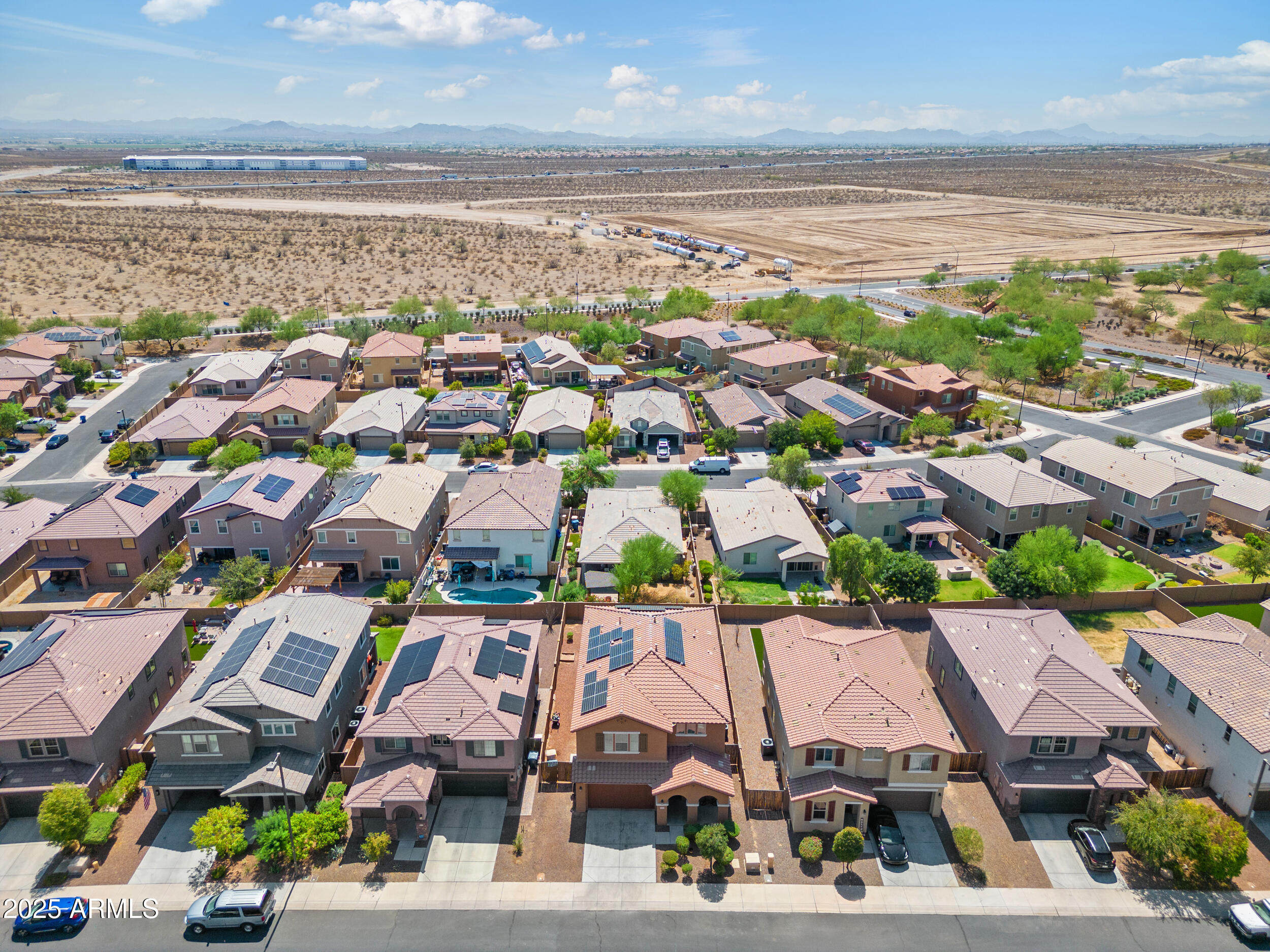 21243 West Coronado Road Buckeye, AZ 85396 - Photo 39 of 49 an aerial view of residential building with beach