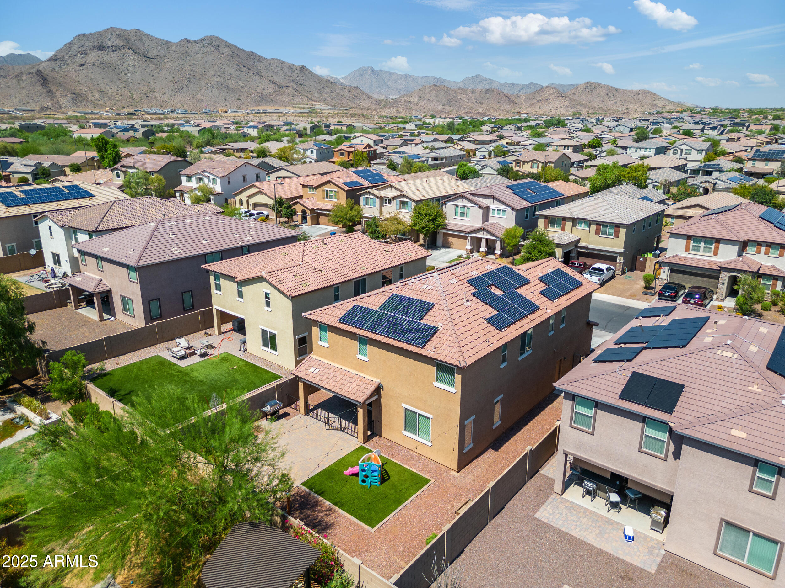 21243 West Coronado Road Buckeye, AZ 85396 - Photo 43 of 49 an aerial view of residential houses with outdoor space and city view