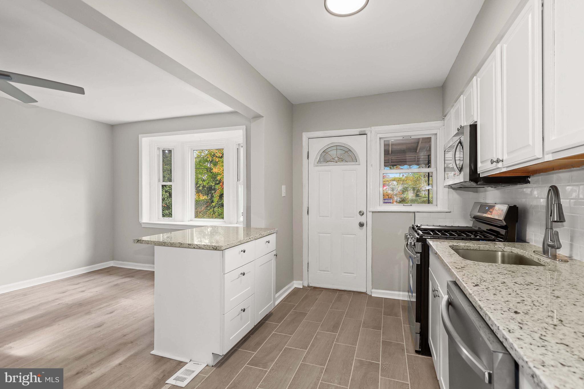 1613 Pentwood Road Baltimore, MD 21239 - Photo 11 of 41 Kitchen-Dining Area