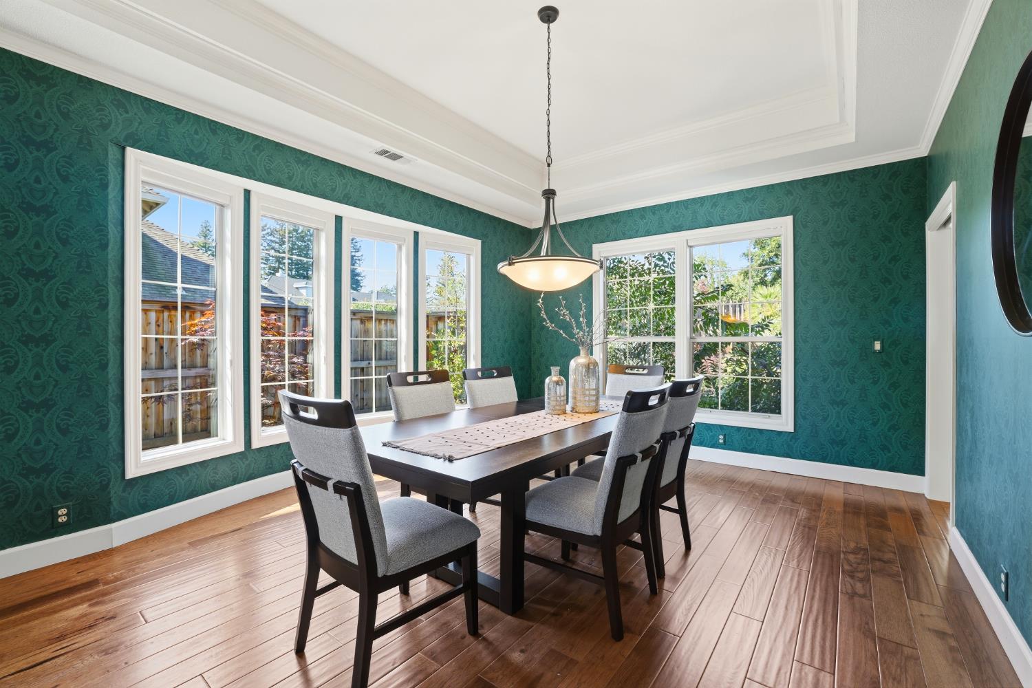 4330 Hale Ranch Lane Fair Oaks, CA 95628 - Photo 17 of 77 a view of a dining room with furniture window and wooden floor