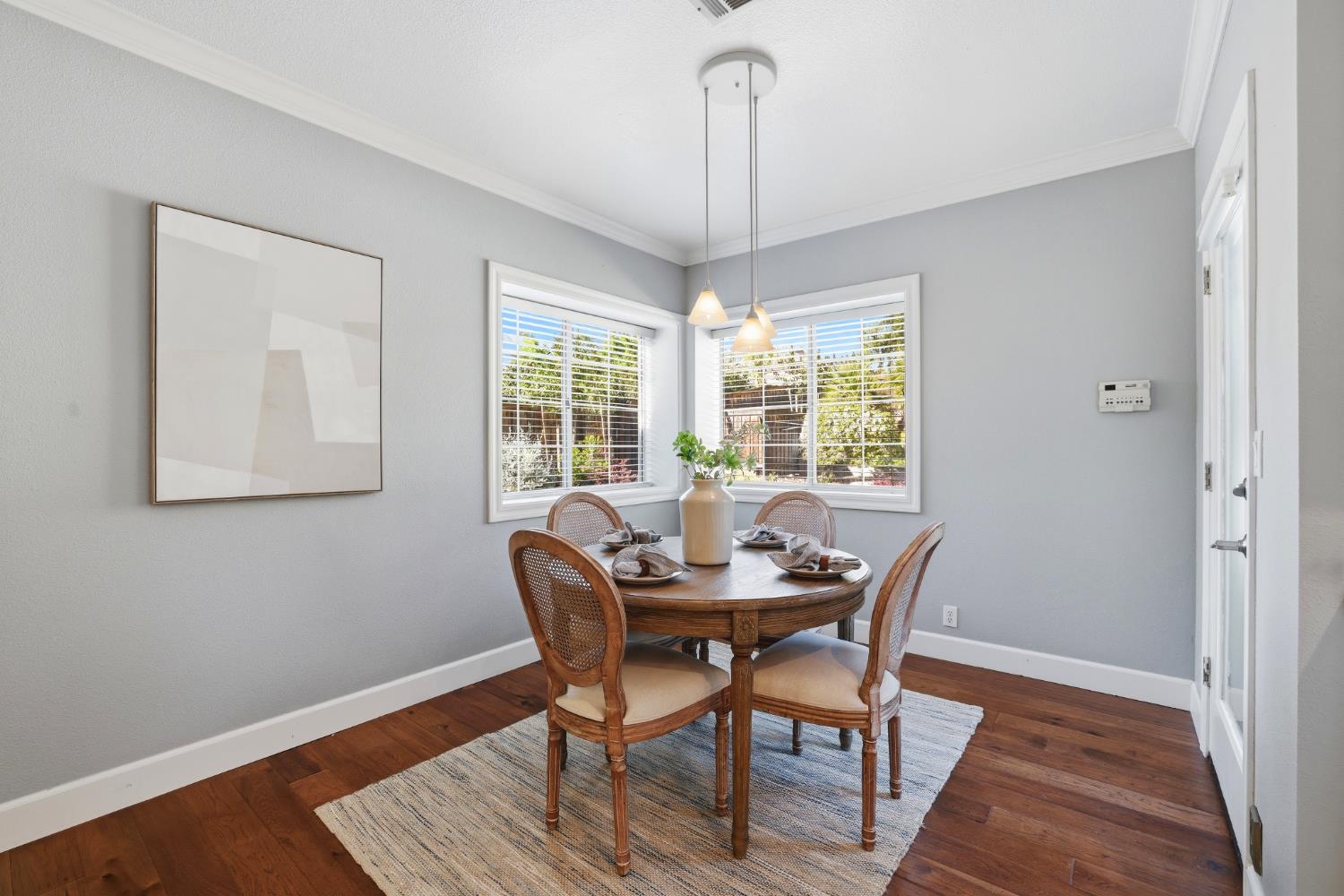 4330 Hale Ranch Lane Fair Oaks, CA 95628 - Photo 22 of 77 a view of a dining room with furniture window and wooden floor