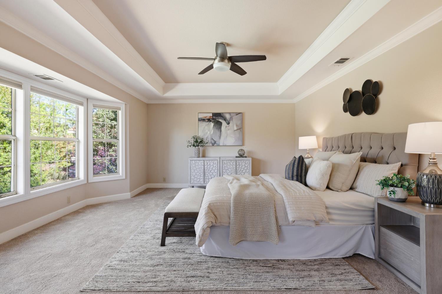 4330 Hale Ranch Lane Fair Oaks, CA 95628 - Photo 43 of 77 a bedroom with a large bed and a large window