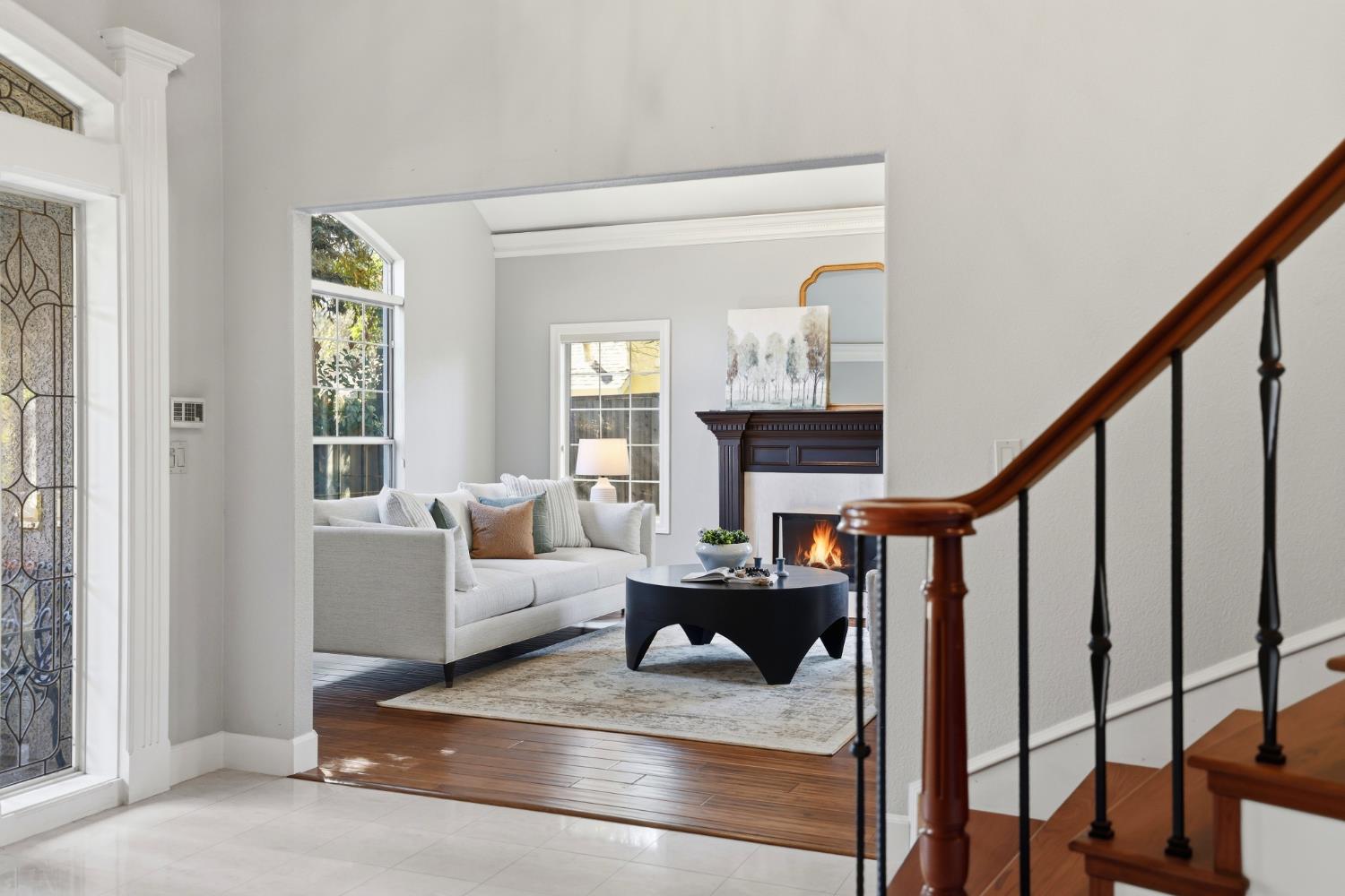 4330 Hale Ranch Lane Fair Oaks, CA 95628 - Photo 9 of 77 a living room with furniture a fireplace and a window