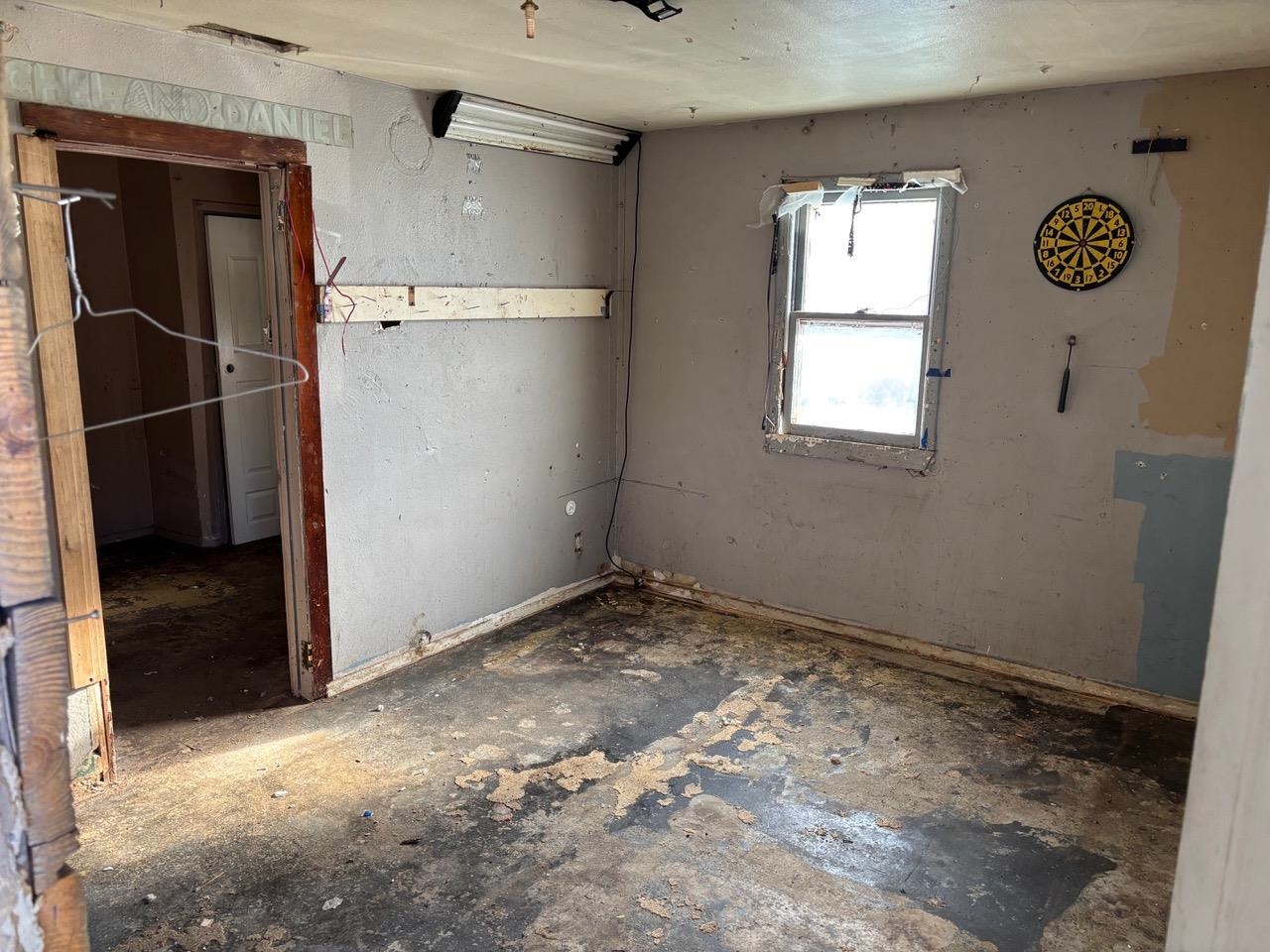 2920 9th Street Rockford, IL 61109 - Photo 2 of 3 a view of storage and utility room with a window