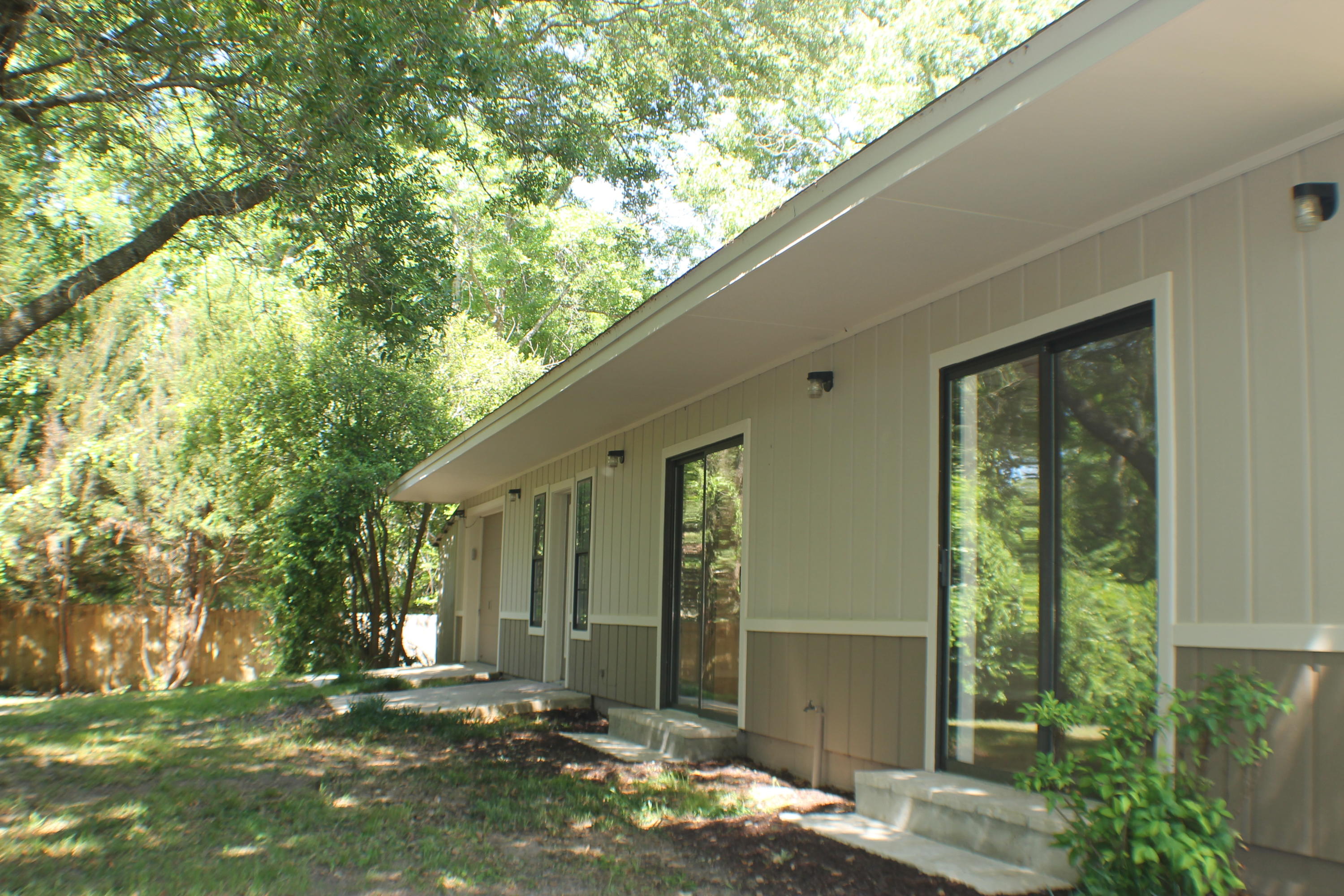 6564 Old River Road Baker, FL 32531 - Photo 50 of 70 a front view of a house with a yard