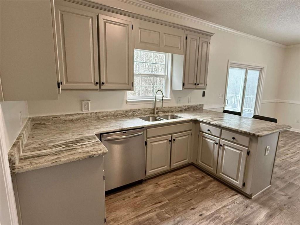 460 Rivers Road Fayetteville, GA 30214 - Photo 17 of 69 a kitchen with stainless steel appliances granite countertop a sink stove and cabinets