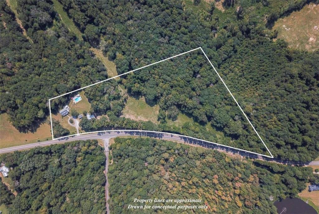 460 Rivers Road Fayetteville, GA 30214 - Photo 3 of 69 a view of a yard from a balcony