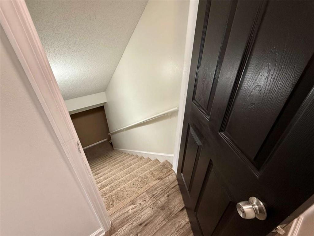 460 Rivers Road Fayetteville, GA 30214 - Photo 49 of 69 a view of an empty room with wooden floor and a window