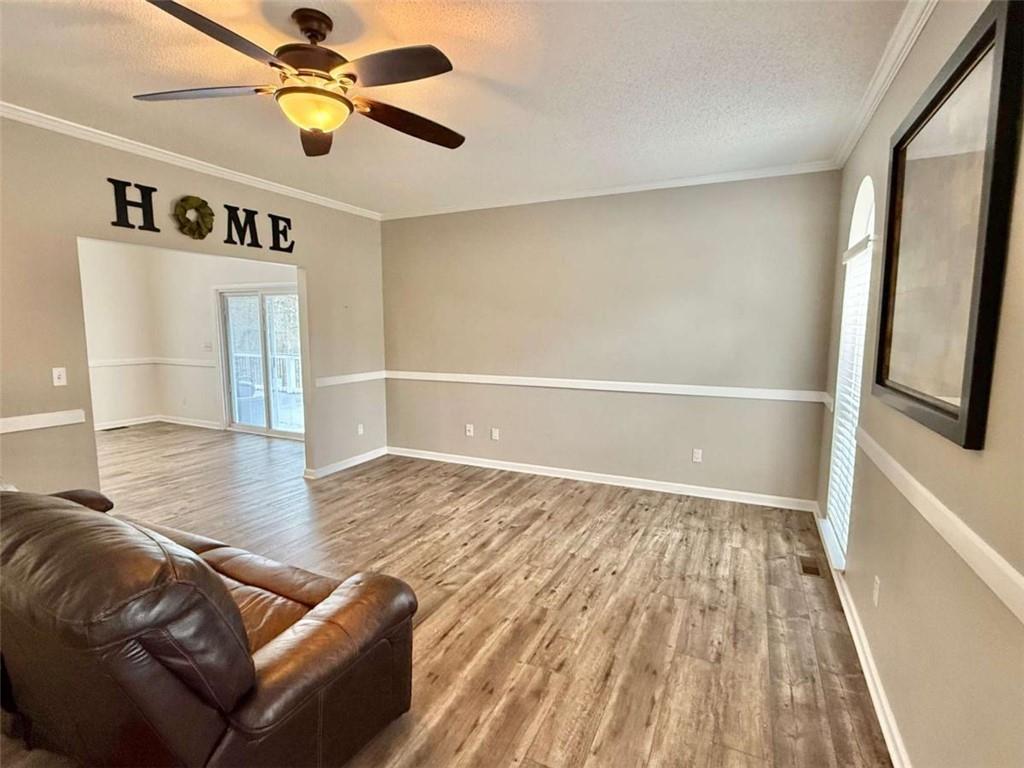 460 Rivers Road Fayetteville, GA 30214 - Photo 7 of 69 a view of livingroom with hardwood floor and ceiling fan