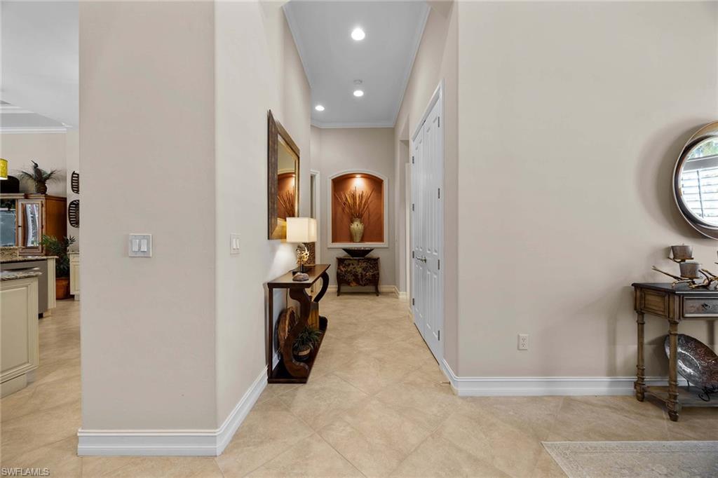 9038 Shenendoah Circle Naples, FL 34113 - Photo 21 of 50 a view of a room with gym equipment