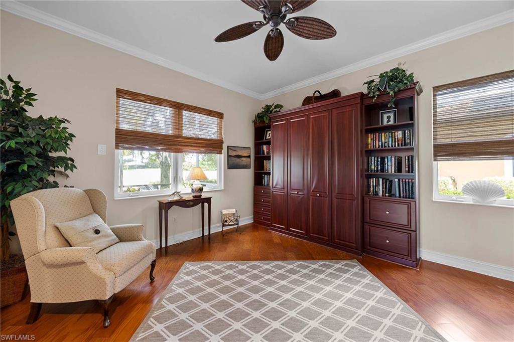 9038 Shenendoah Circle Naples, FL 34113 - Photo 28 of 50 a living room with furniture and window