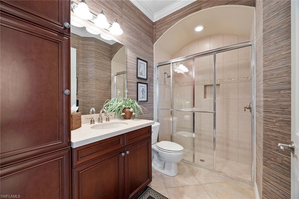 9038 Shenendoah Circle Naples, FL 34113 - Photo 29 of 50 a bathroom with a sink toilet and shower