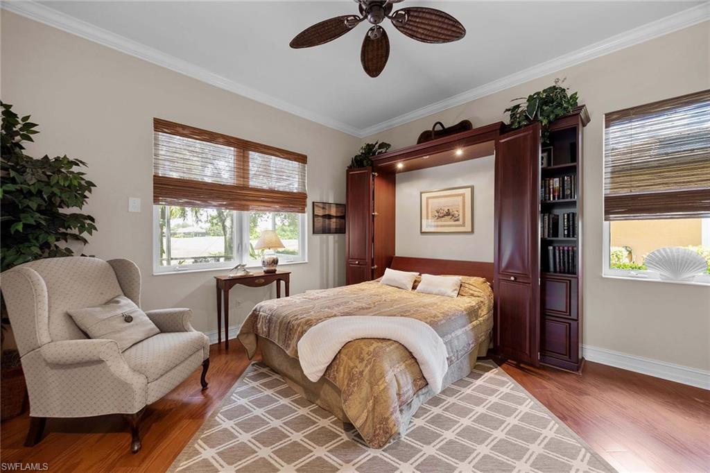 9038 Shenendoah Circle Naples, FL 34113 - Photo 30 of 50 a bedroom with bed and window