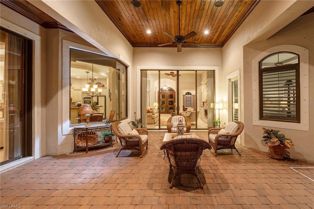 9038 Shenendoah Circle Naples, FL 34113 - Photo 38 of 50 a living room with furniture