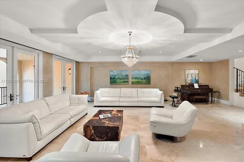 a living room with furniture rug and window