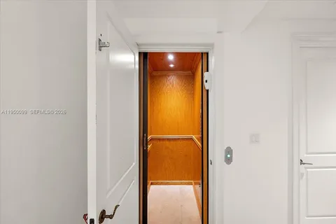 a living room with furniture flat screen tv and a couch