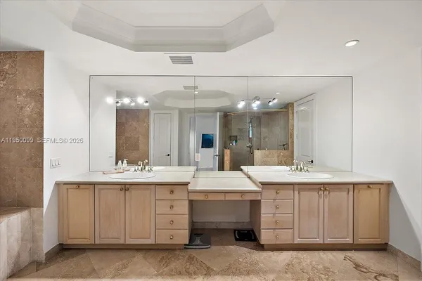 a view of hallway with wooden floor