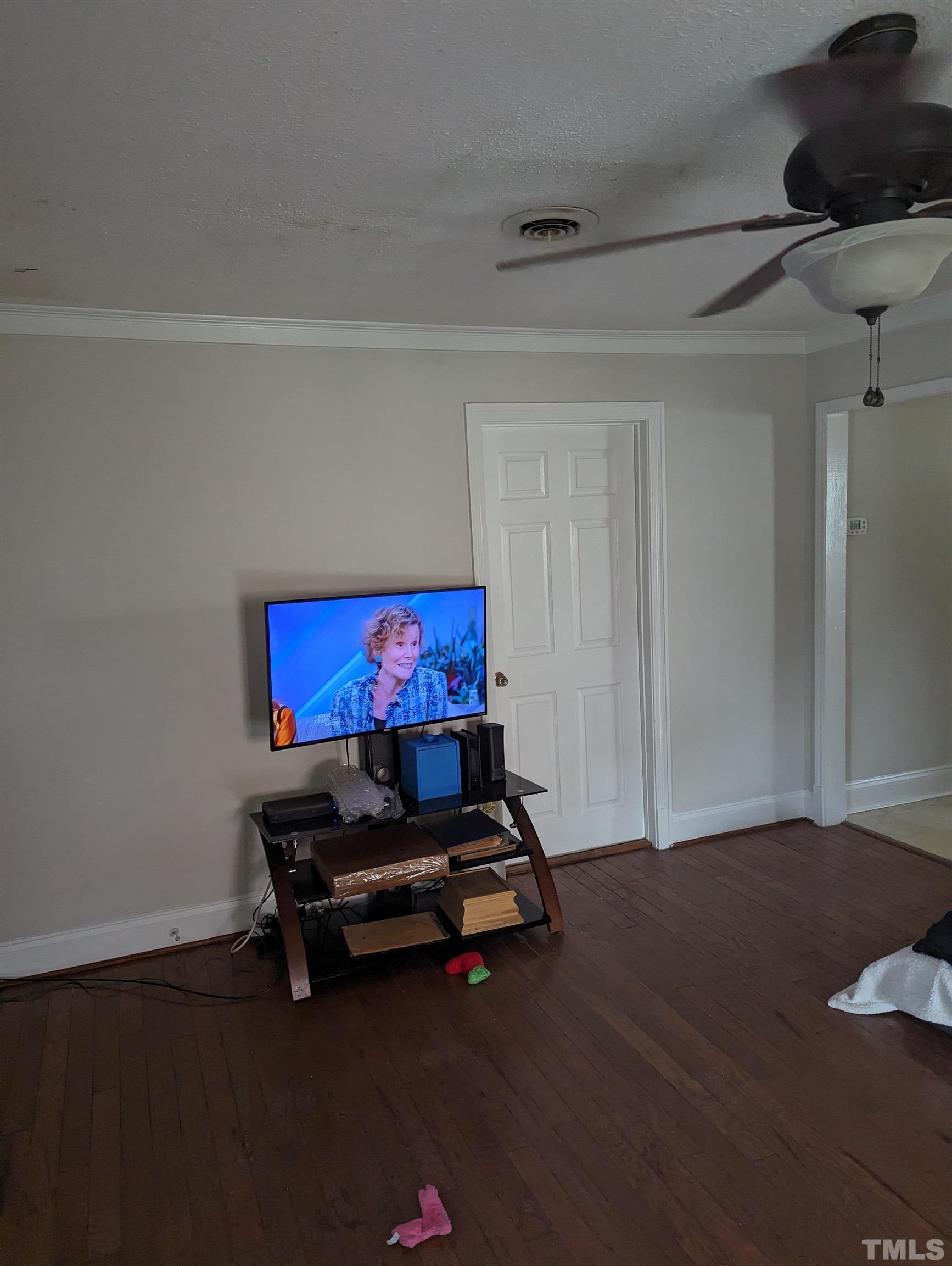 208 East Main Street Coats, NC 27521 - Photo 17 of 27 a room with furniture