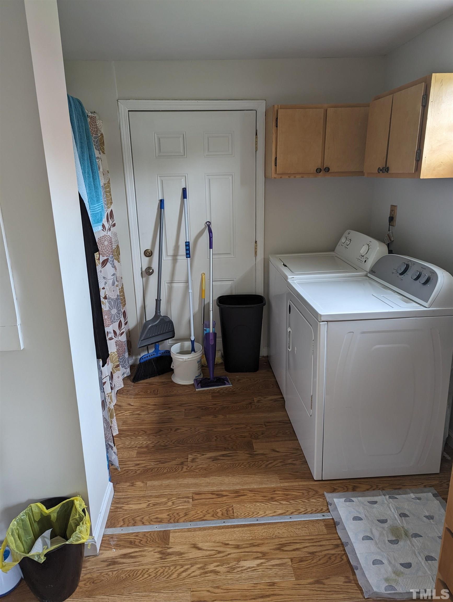 208 East Main Street Coats, NC 27521 - Photo 18 of 27 a view of a storage and utility room with empty racks