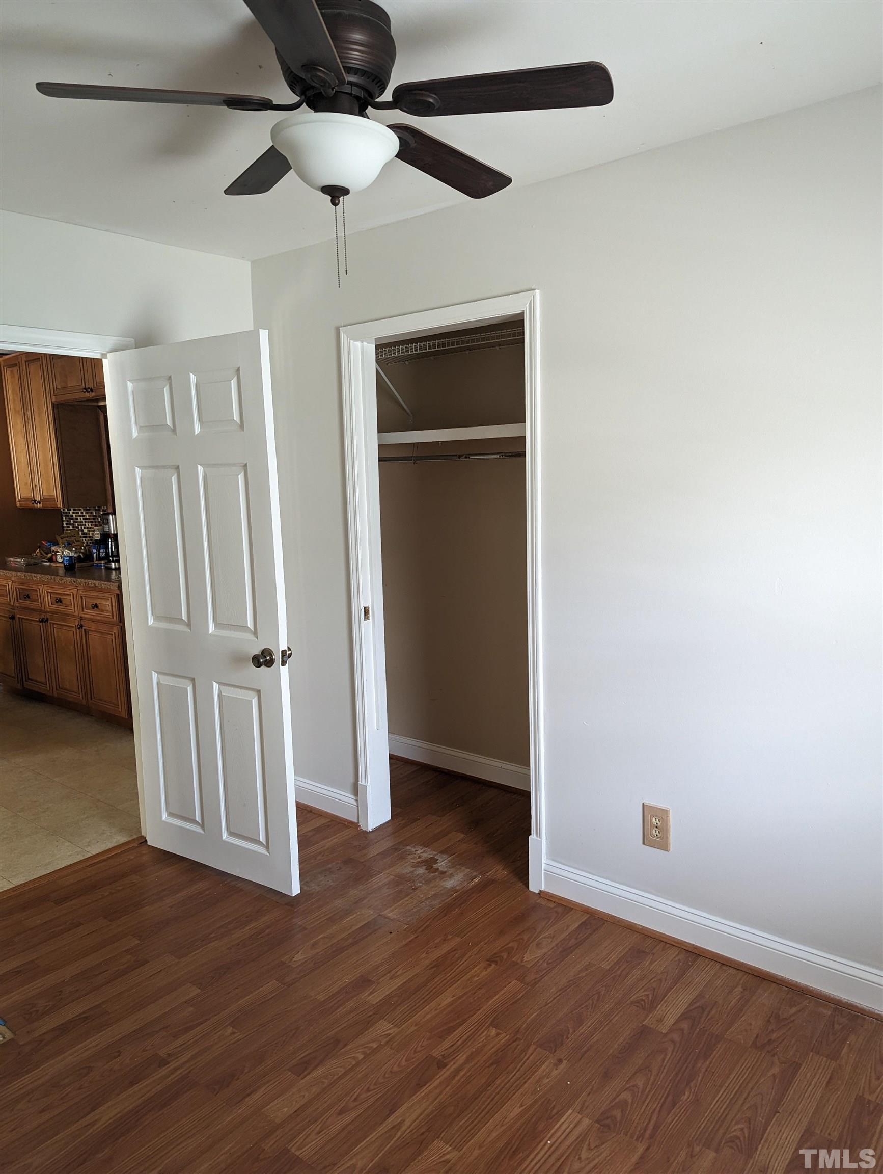 208 East Main Street Coats, NC 27521 - Photo 3 of 27 wooden floor in an empty room