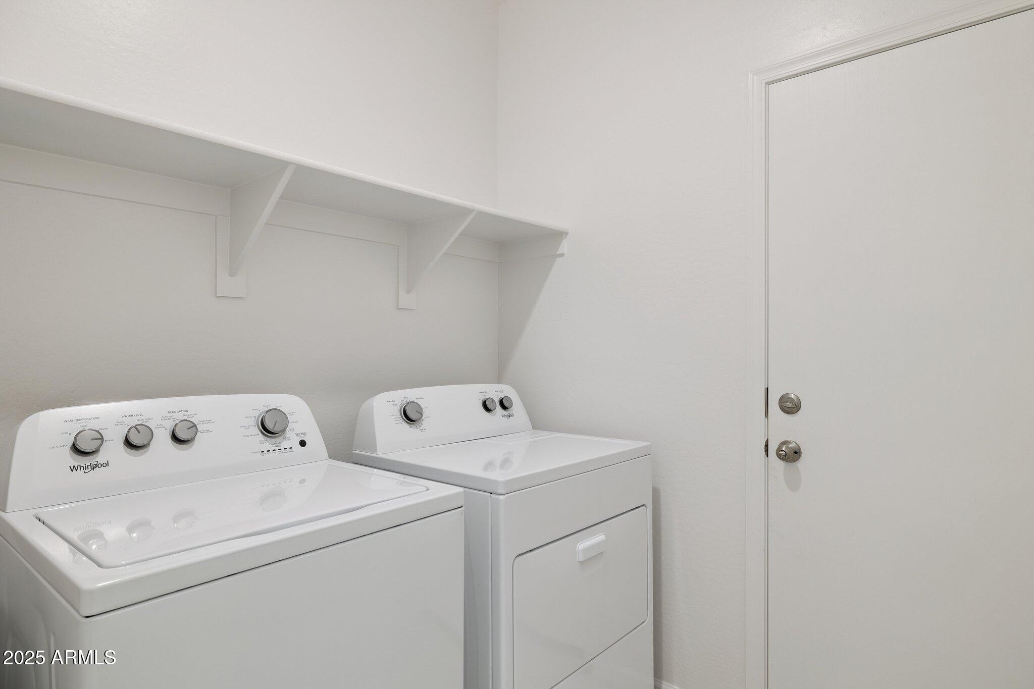 25471 West Fraktur Road Buckeye, AZ 85326 - Photo 11 of 17 a utility room with dryer and washer