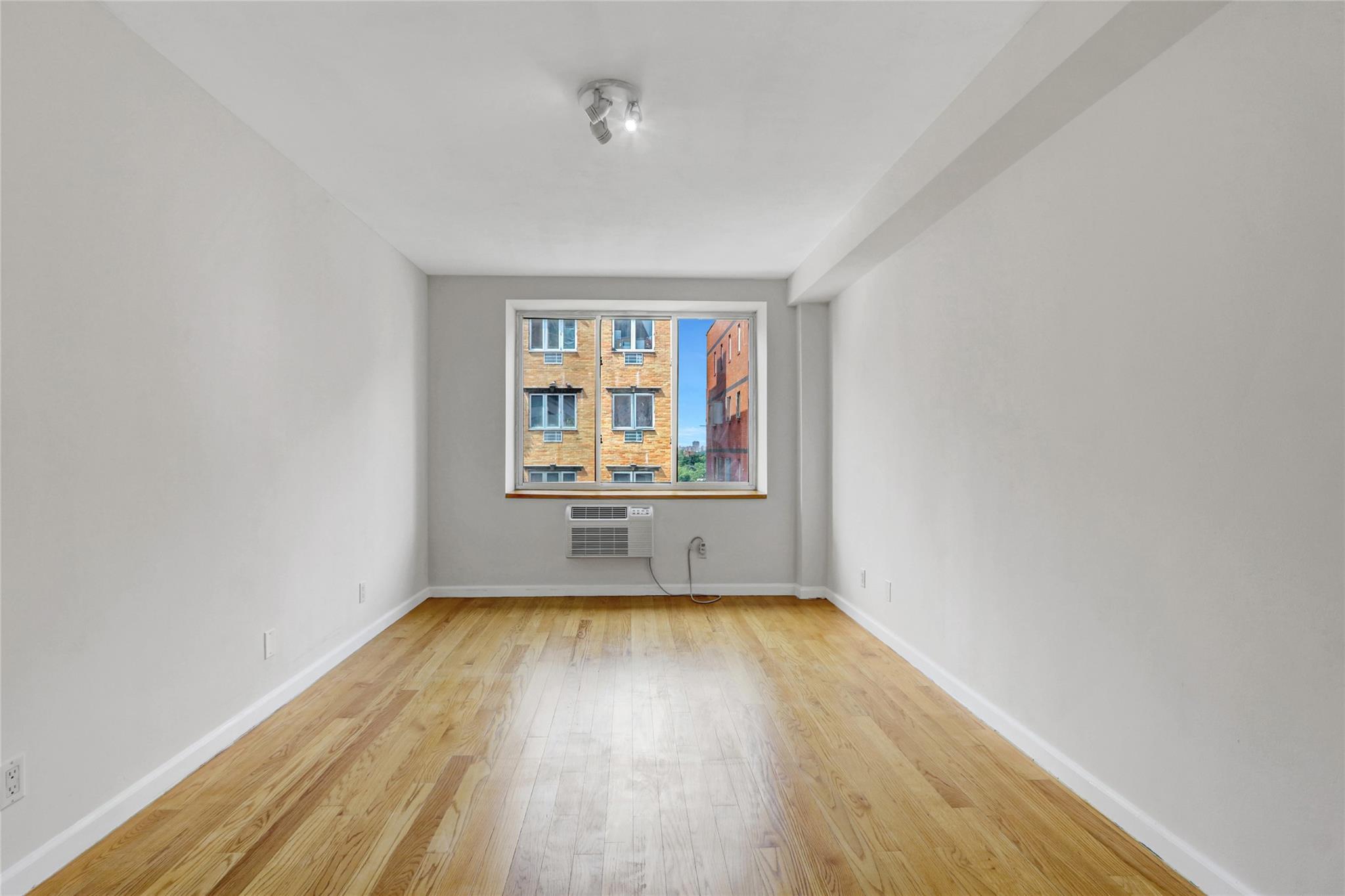 43-17 Union Street, Unit 5A Queens, NY 11355 - Photo 12 of 19 Spare room with light wood-style floors
